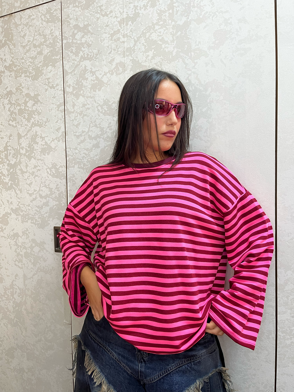Maglia manica lunga garzata a righe fucsia e bordeaux oversize